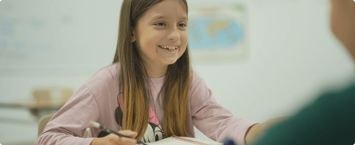 Student smiling during class